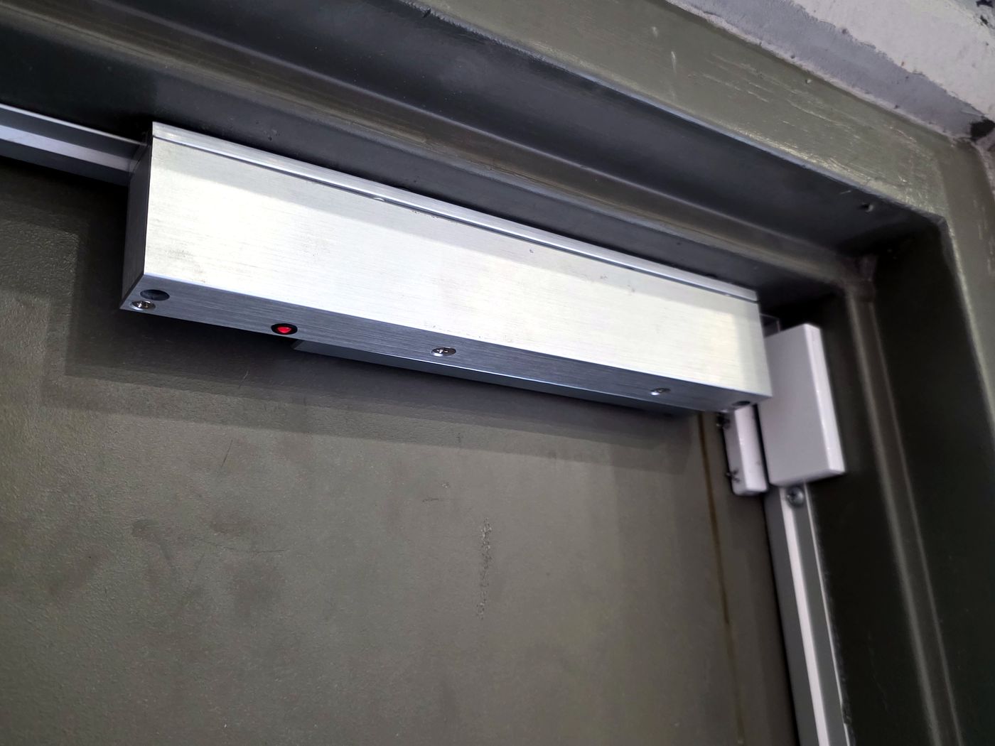 Magnetic lock and access hardware installed on a commercial door by Miclyn